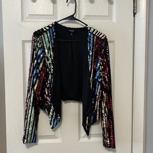 Size 0 from torrid. Used once no rips no stains no missing sequence true to size